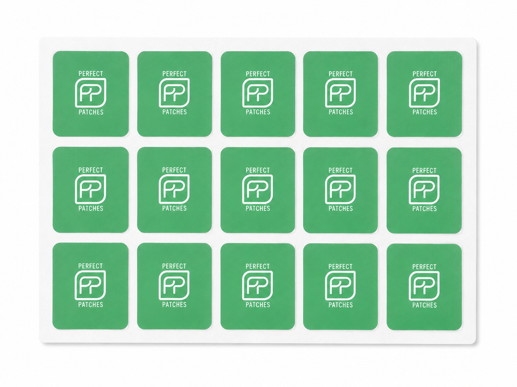 Sheet of green Perfect Patches Feel Good patches shown in a three by five grid