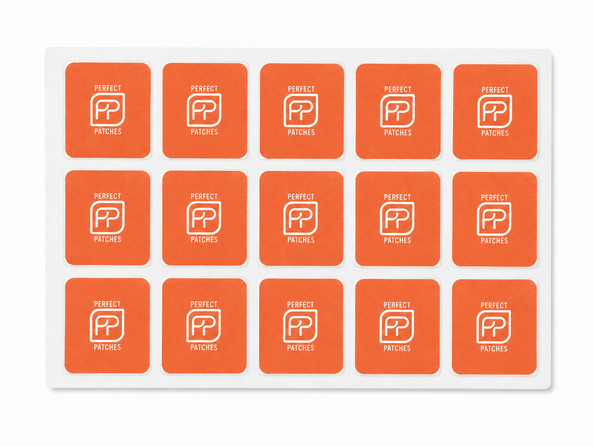 Sheet of orange Perfect Patches Mood patches shown in a three by five grid